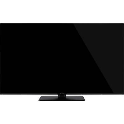 A flat-screen TV with a black frame and a central stand, displaying a blank screen.
