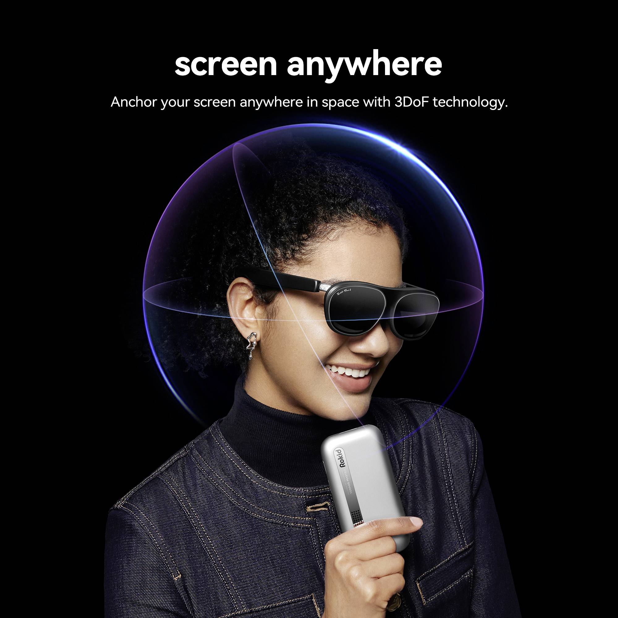 A person wearing glasses smiles while holding a sleek, modern-looking device, with text above: 'Anchor your screen anywhere with 3DoF technology.'