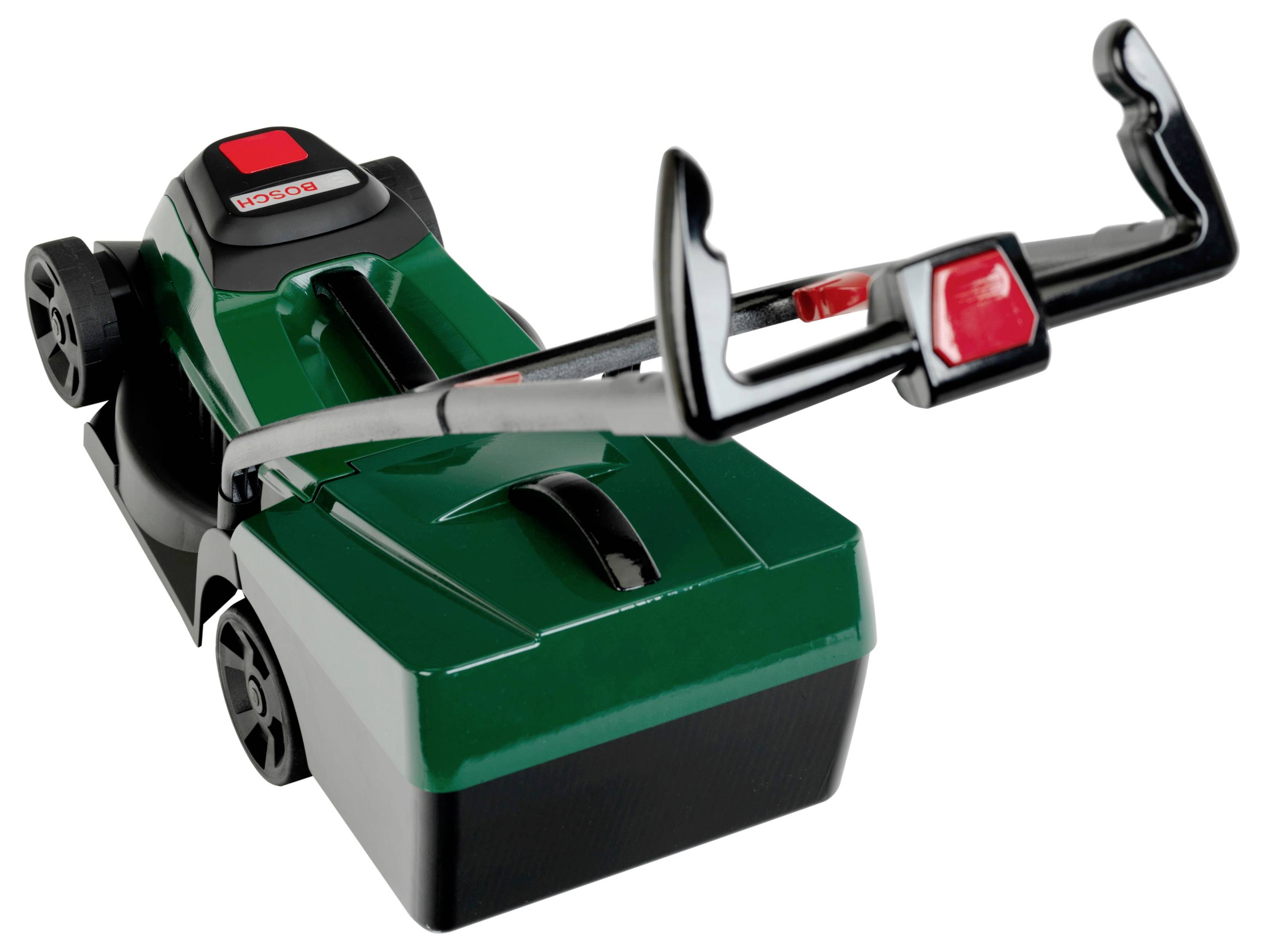 A green and black manual lawn mower with a large red button on the handle is shown on a white background.