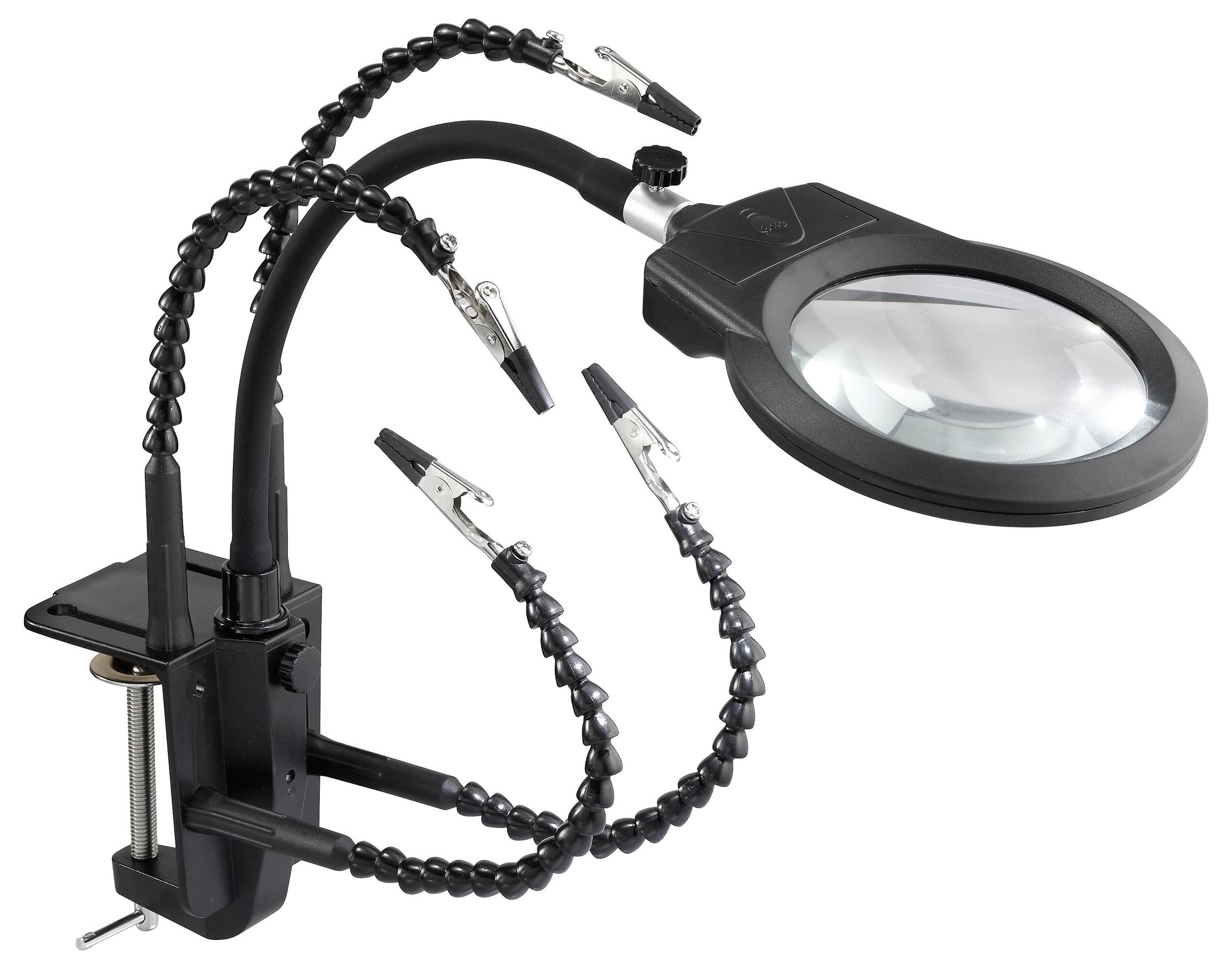 A magnifying glass with adjustable arms and clamps is attached to a desk, used for hands-free precision work.