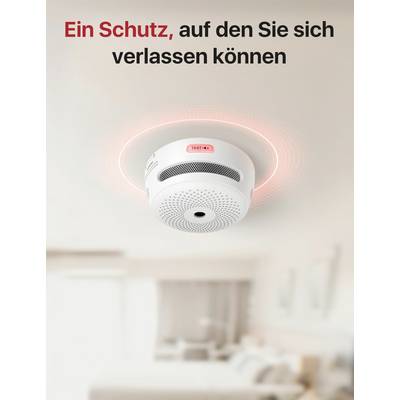 A smoke detector on the ceiling with a red light circle in the room. Text above: 'A protection you can rely on'.