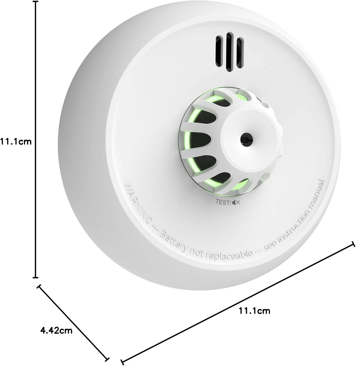 A round smoke detector with green indicator lights, labeled 'TEST1X'. Warning text notes the battery is non-replaceable. Dimensions: 11.1 cm diameter, 4.42 cm height.