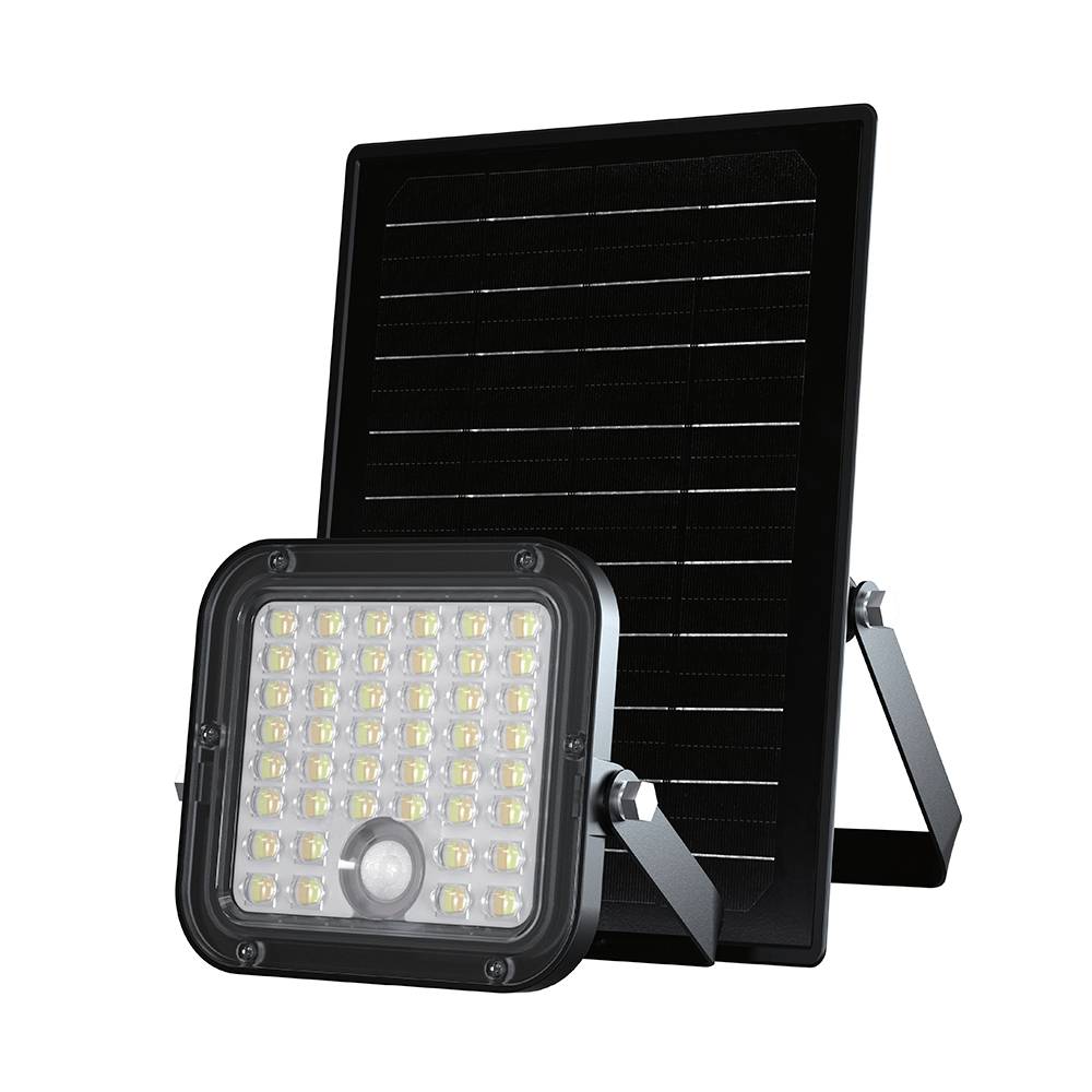 'Solar-powered LED floodlight with a motion sensor, positioned in front of a black solar panel, designed for outdoor lighting.'