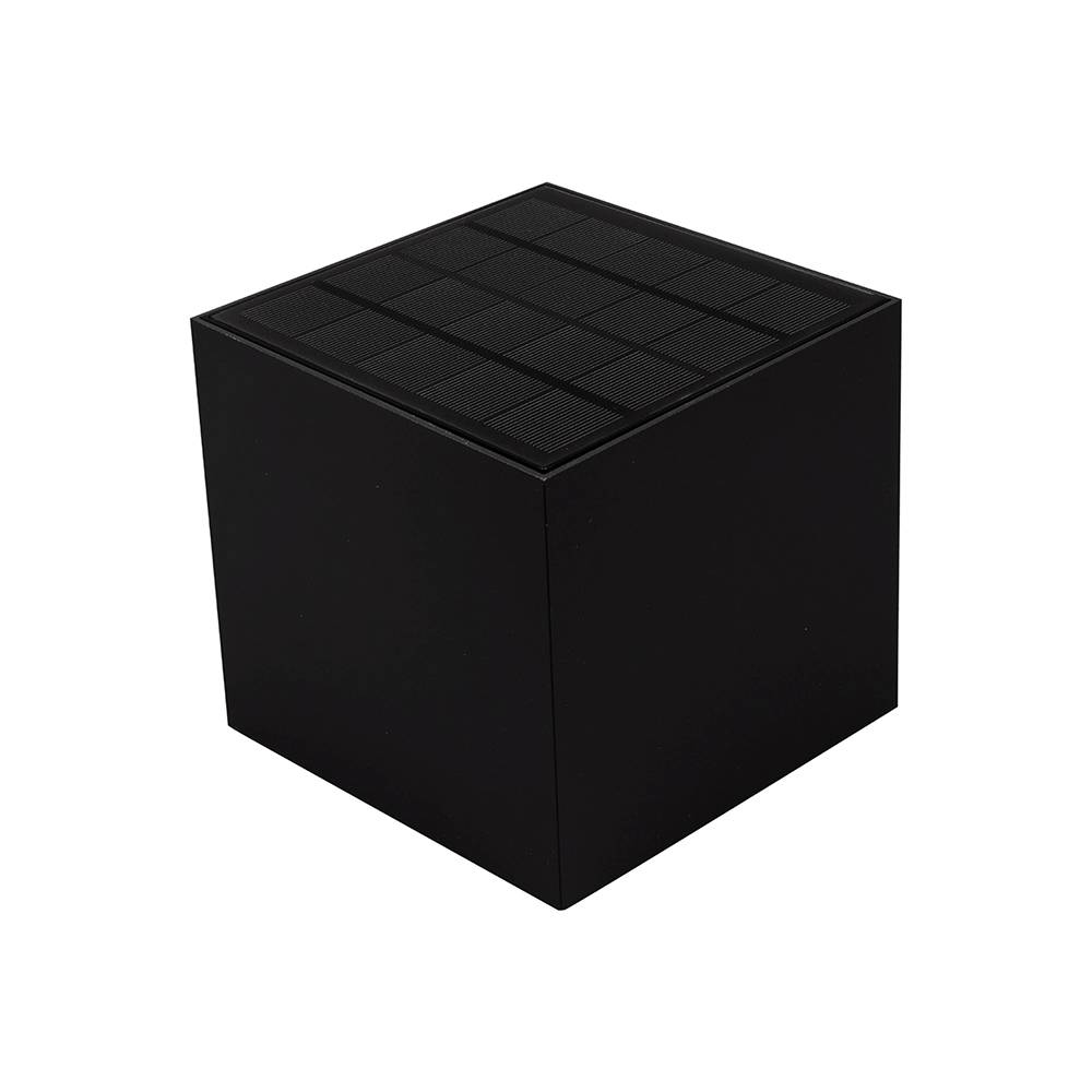 A black cube with a textured top surface, appearing as a minimalist decorative object or product design.