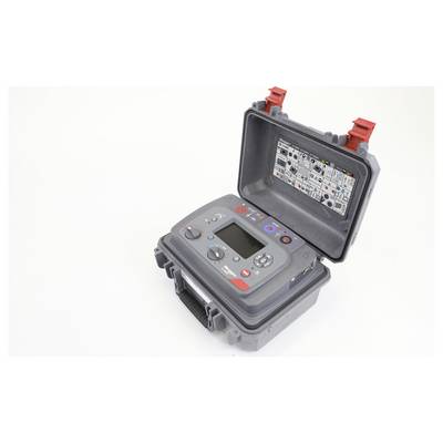 A gray portable testing device with buttons and dials is open, revealing controls and a digital screen. The interior lid shows usage instructions.