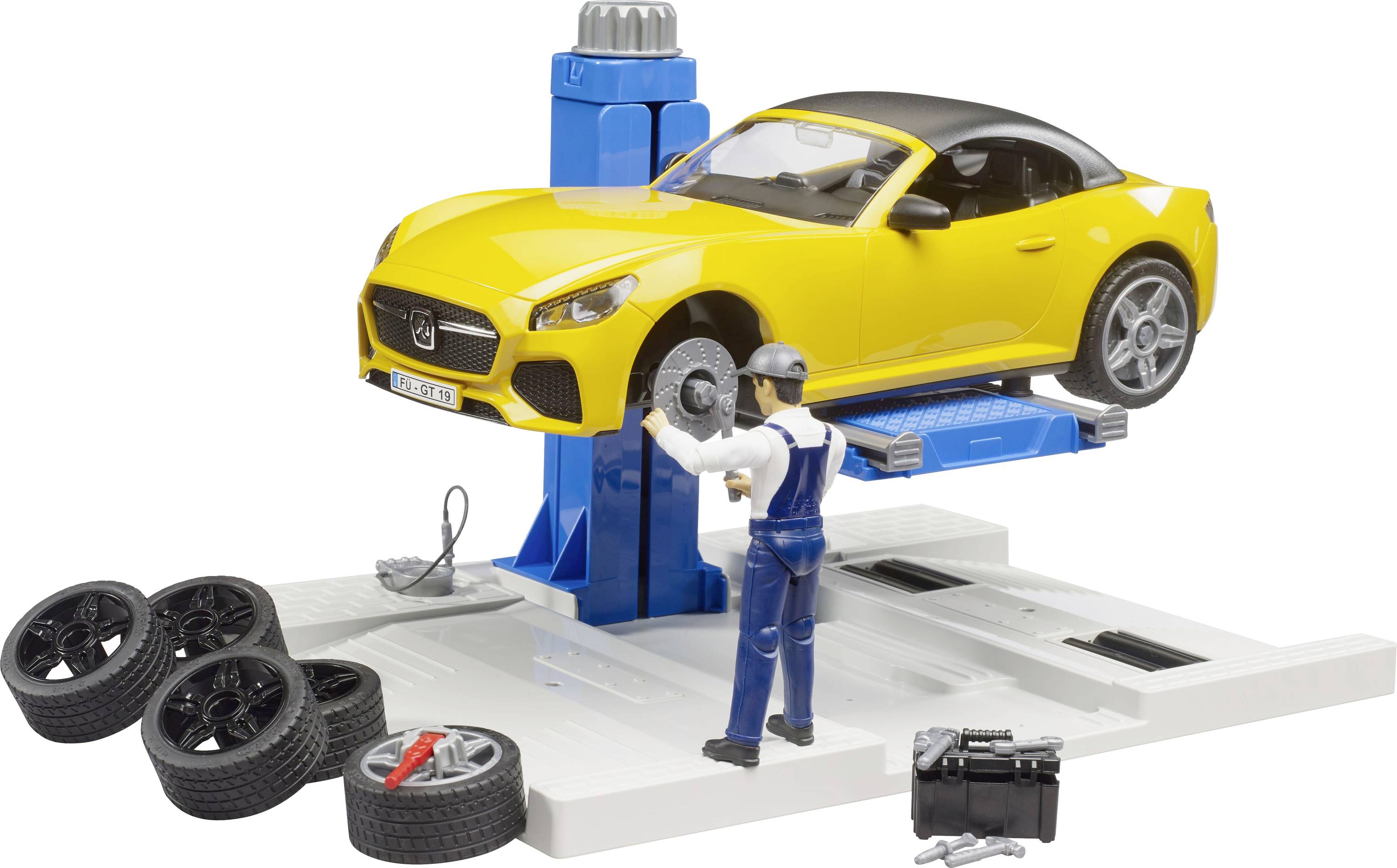 A toy mechanic works on a yellow sports car on a lift. Spare tires and tools are nearby, depicting a car repair scene.