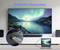 A laptop displays an 8K image on a large TV via HDMI, showing a serene northern lights scene. Text reads '8K@60Hz Resolution.'