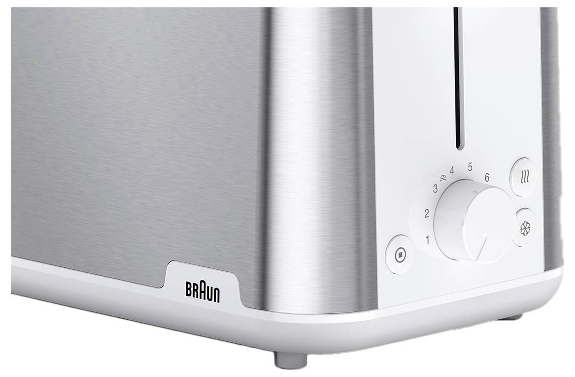 A sleek silver and white toaster with the 'Braun' logo, featuring a browning control dial labeled 1 to 6, defrost and reheat buttons.