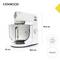 A white Kenwood kMix stand mixer with a stainless steel bowl, dimensions: 35.5 cm high, 38.5 cm deep, 24 cm wide, 1000W power.