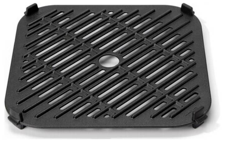 A black square grate with a central hole, featuring parallel and perpendicular slats, used for drainage or ventilation purposes.