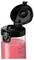 A clear blender bottle with a black lid, filled with pink smoothie up to the maximum mark, showing measurements on the side.