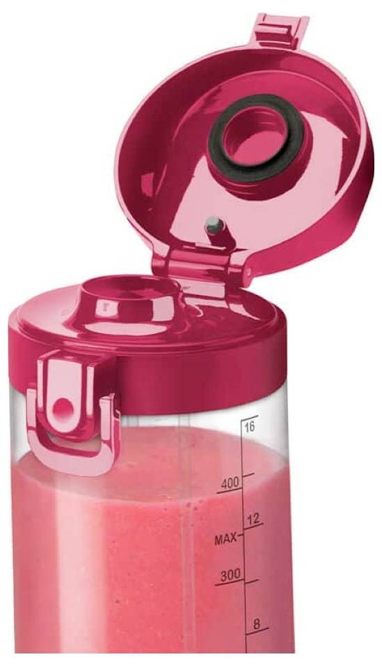 A red blender bottle with an open lid, clipped spout, and volume measurements on the side, partially filled with pink liquid.