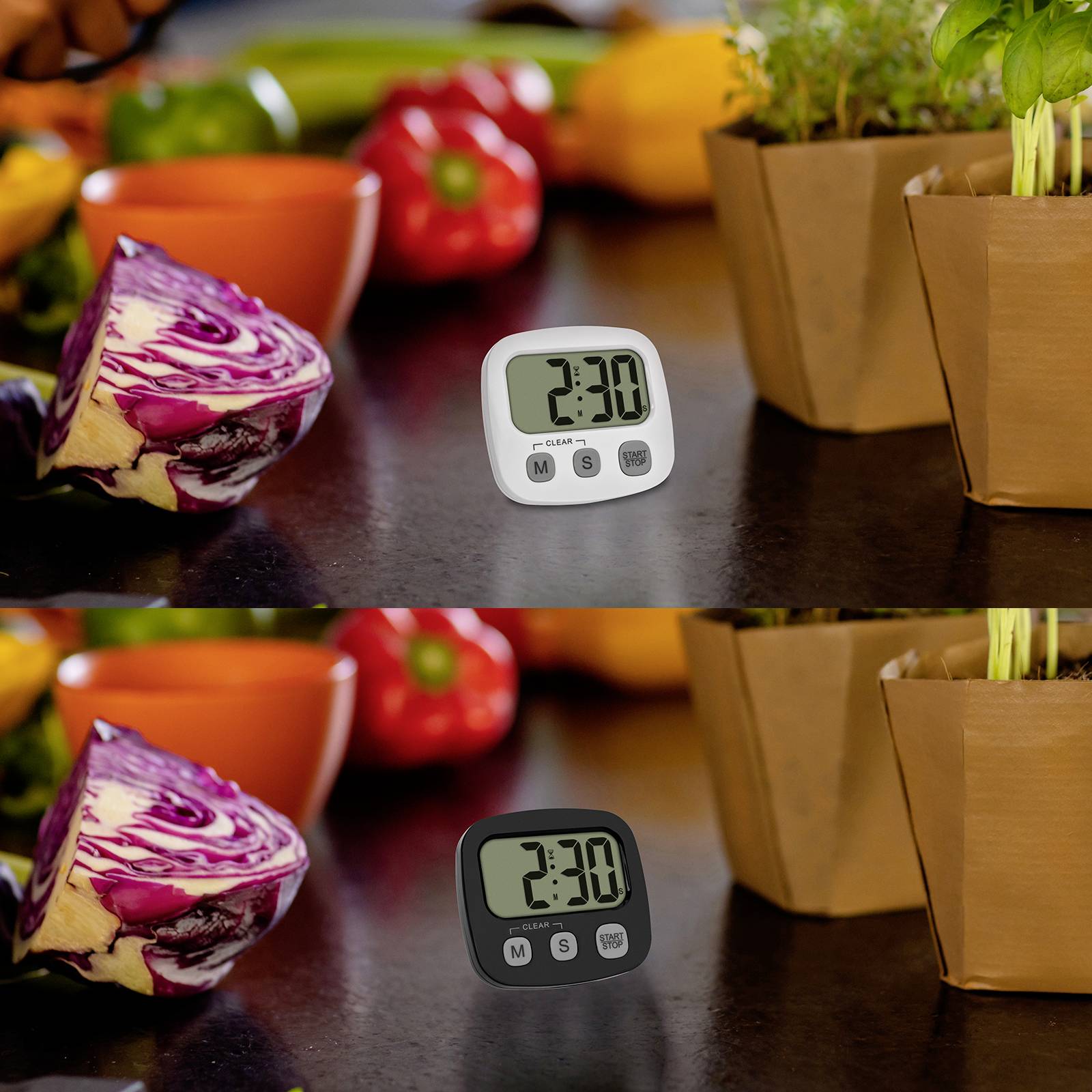 Two kitchen timers, one shows '2:30' and the other '1:30'. Surrounded by vegetables and plants on a kitchen counter.