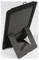A black folio case with a stand, shown from the back. The stand holds the case upright, presumably for use with a tablet or e-reader.