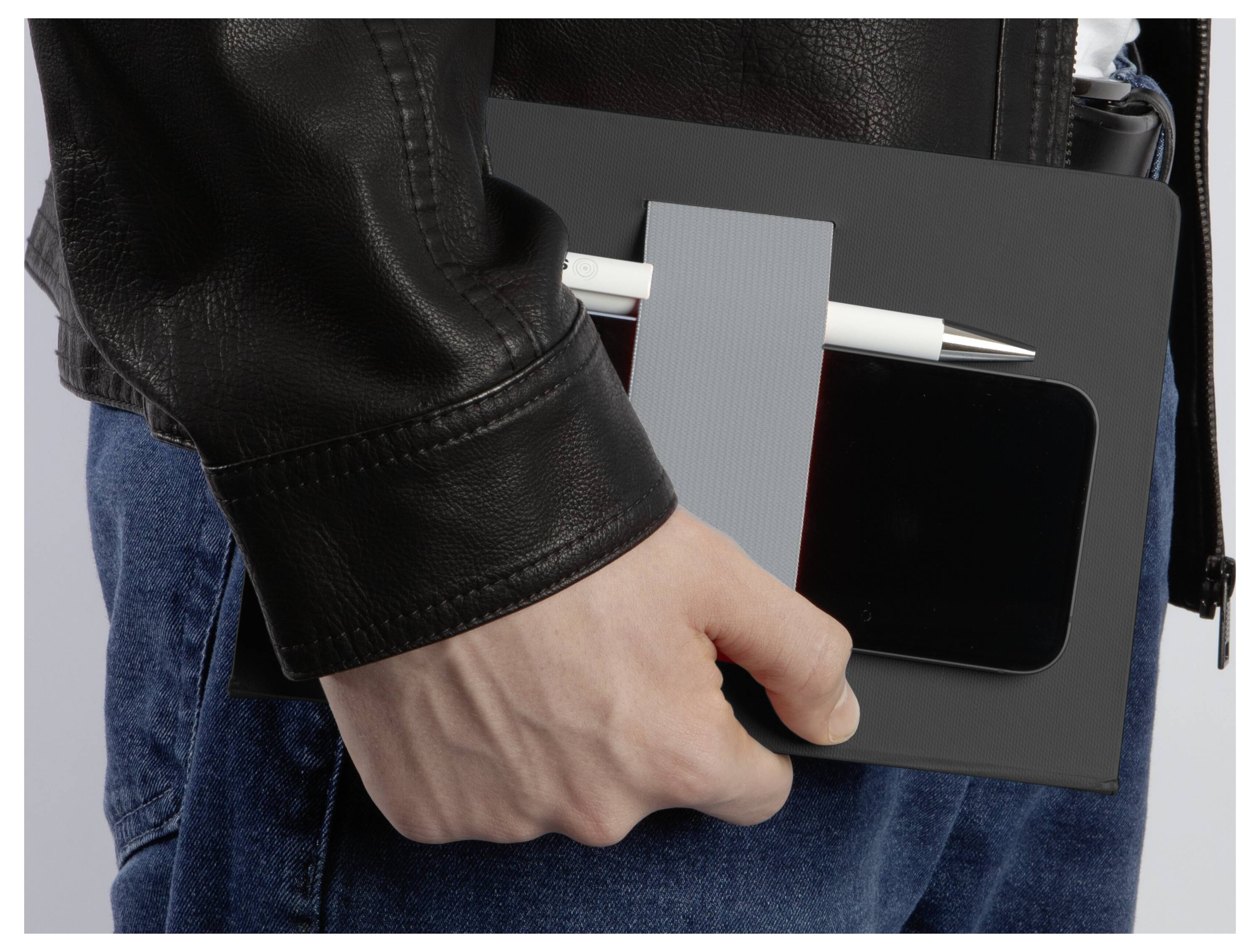 Close-up of a person holding a black portfolio clipboard with a pen clipped to it.