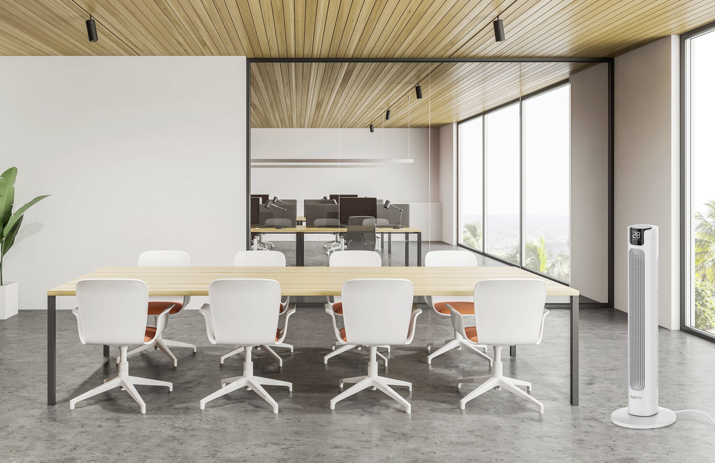 A modern conference room with a long table, white chairs, large windows, an indoor plant, and a standing fan to the right.