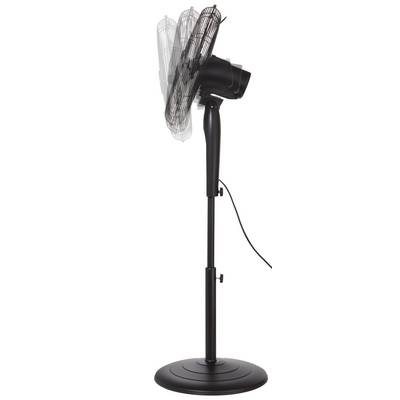 A black oscillating pedestal fan with an adjustable height and tilting head, shown from the side with a visible power cord.