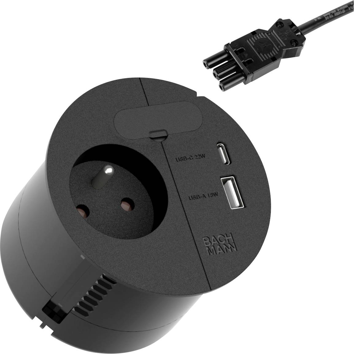 A round black power outlet with two USB ports and a plug is shown. The outlet is branded with 'BACHMANN' and supports USB charging.