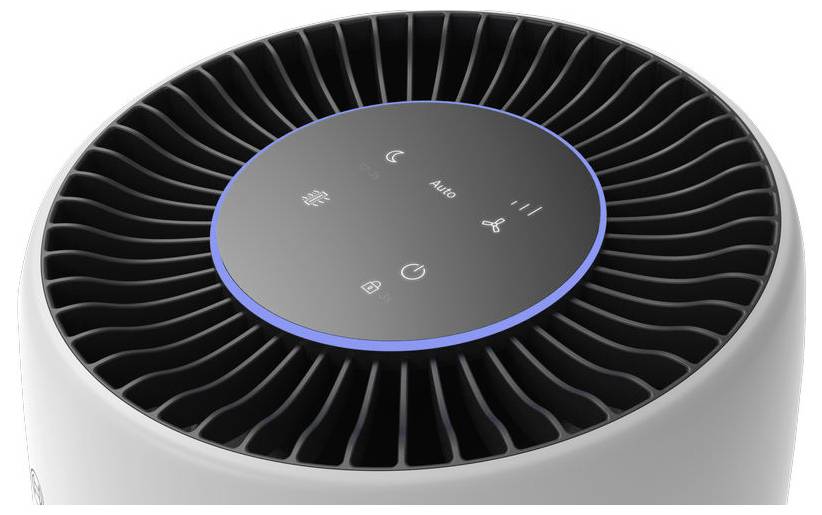 Air purifier close-up showing the top control panel with touch buttons for power, mode, fan speed, and night mode, highlighted by a blue ring.