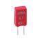 A red rectangular electronic component with two metal leads, marked 'WIMA 0.1 63-'.