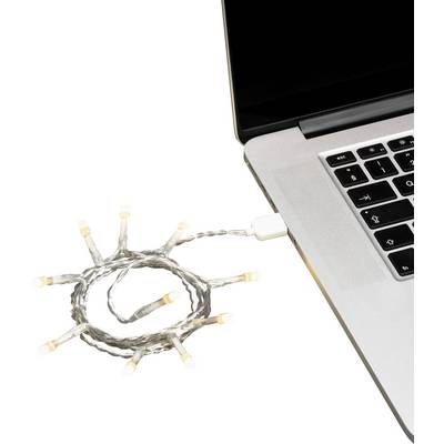 A short string of LED fairy lights is plugged into a laptop USB port, illuminating softly.
