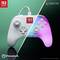 A Nintendo Switch controller split design: left half shows a white controller with standard buttons; right half emits colorful lights.