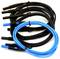 A coiled blue electronic cable lies atop five coiled black cables, showing contrast in color and cable arrangement.