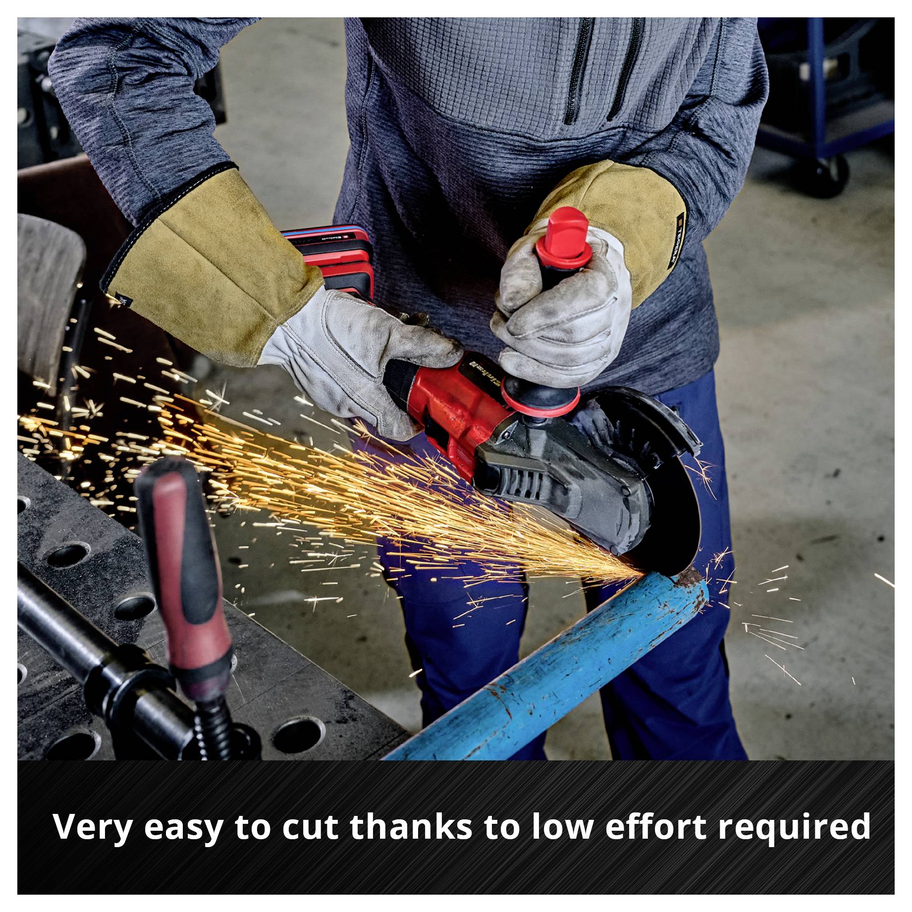 Person in work clothing cutting a metal pipe with an angle grinder. Sparks are flying. Text in the image: 'Very light cut with minimal effort required'.
