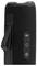 A cylindrical black Bluetooth speaker with textured fabric, control buttons, and a carrying strap.