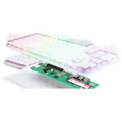 A keyboard disassembled to show its circuit board and internal components, with a colorful lighting effect on the keys.