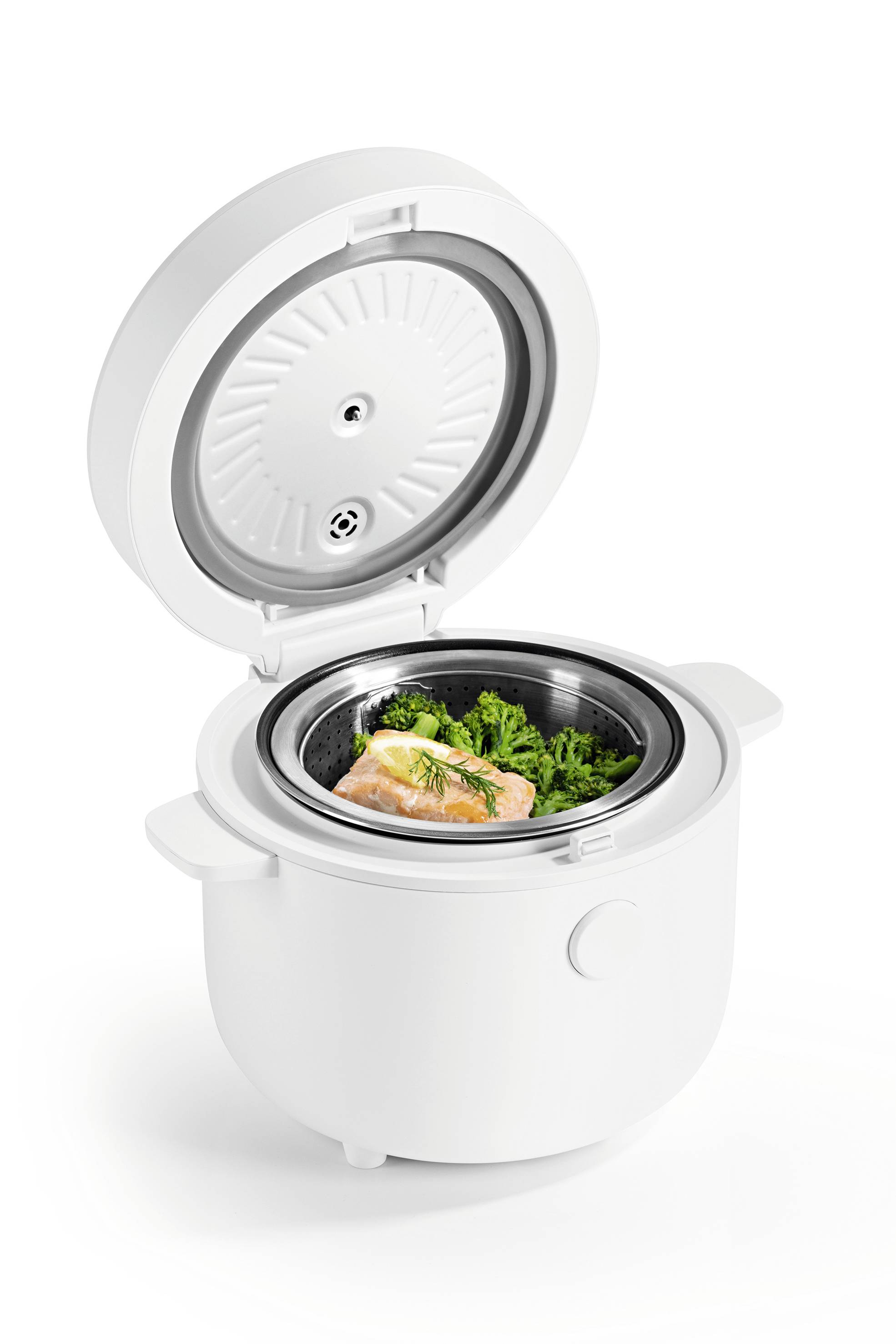 A white rice cooker with an open lid containing cooked salmon and steamed broccoli, showcasing the appliance's function and food presentation.