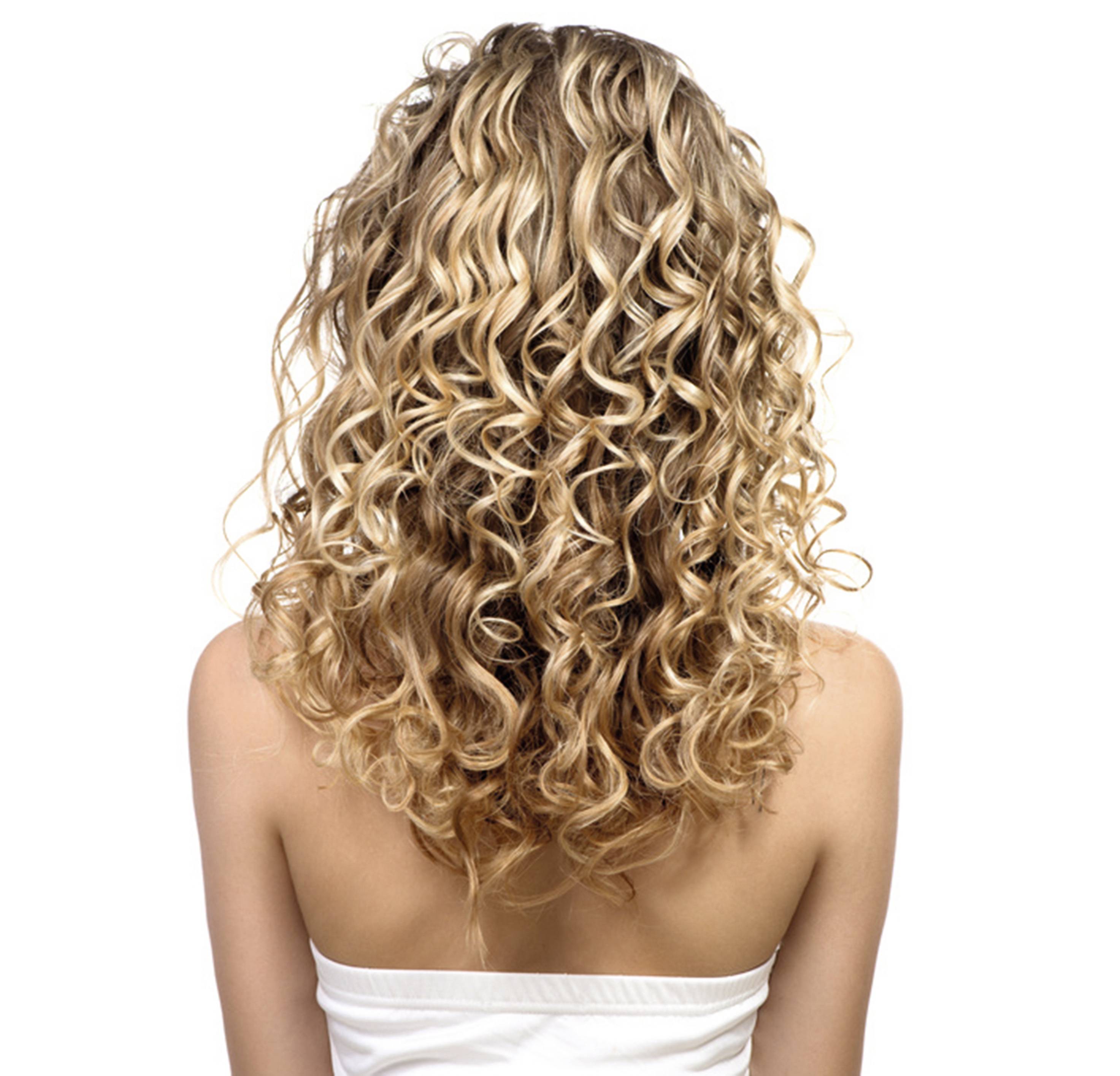 A person with long, tight blonde curls is shown from behind, wearing a strapless white top. The background is plain white.