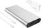 A silver power bank with LED indicators, USB and Type-C ports, and a white charging cable. A separate wall charger is included.