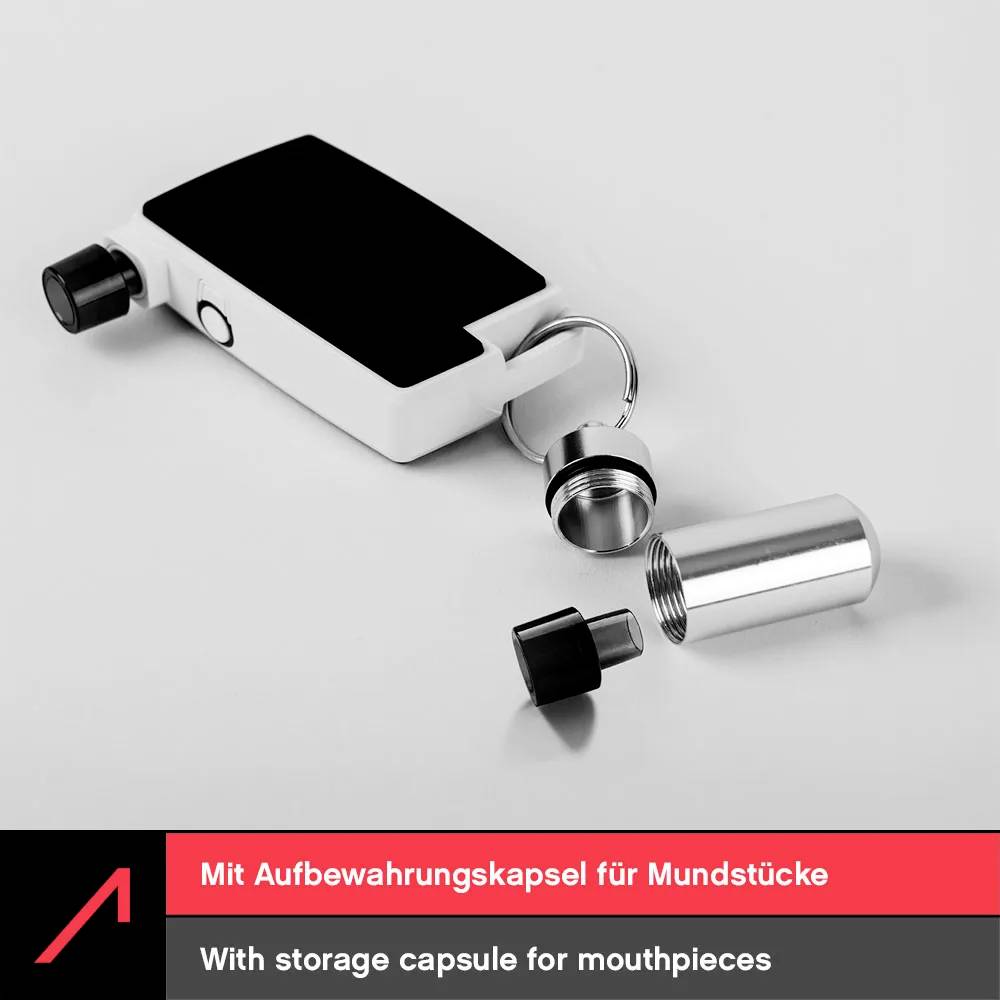 A rectangular device with a detachable cylindrical capsule for mouthpieces lies open on a white surface.