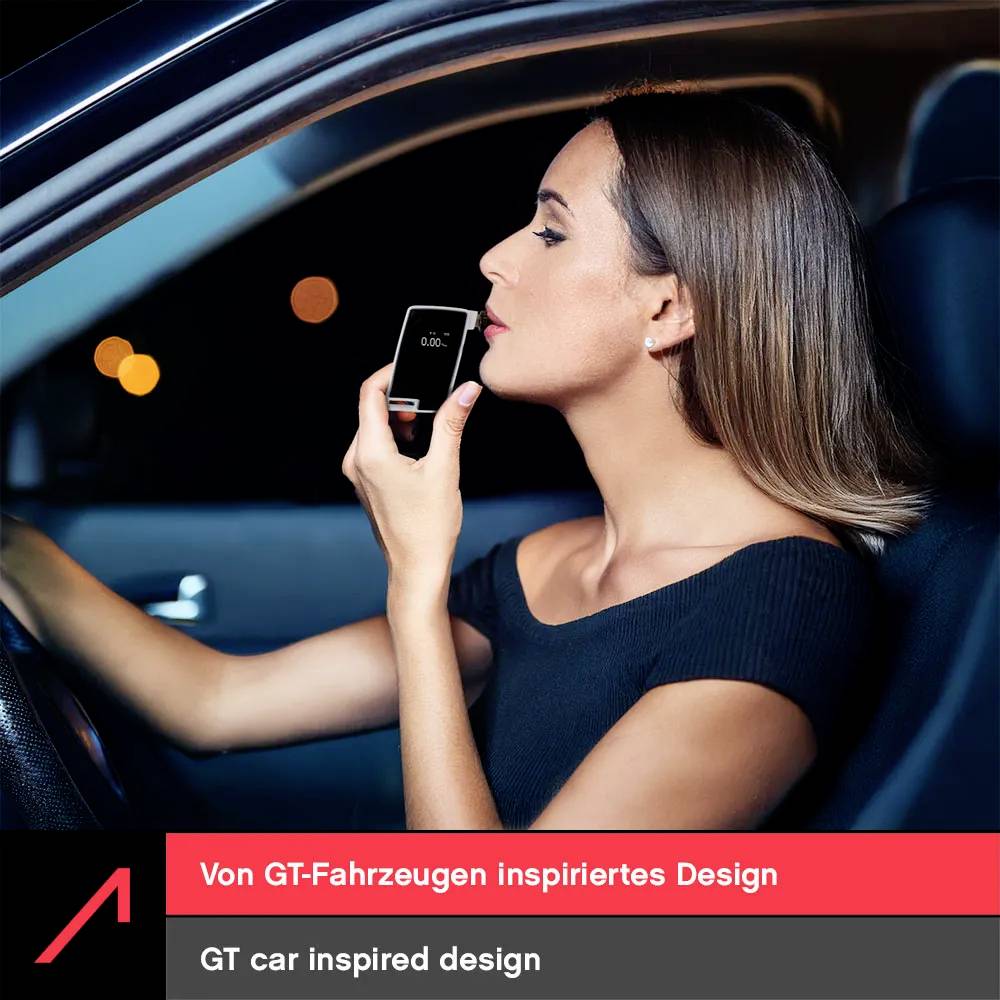 A woman in a car applies lipstick while checking her reflection in a phone screen. Text below reads 'GT car inspired design'.