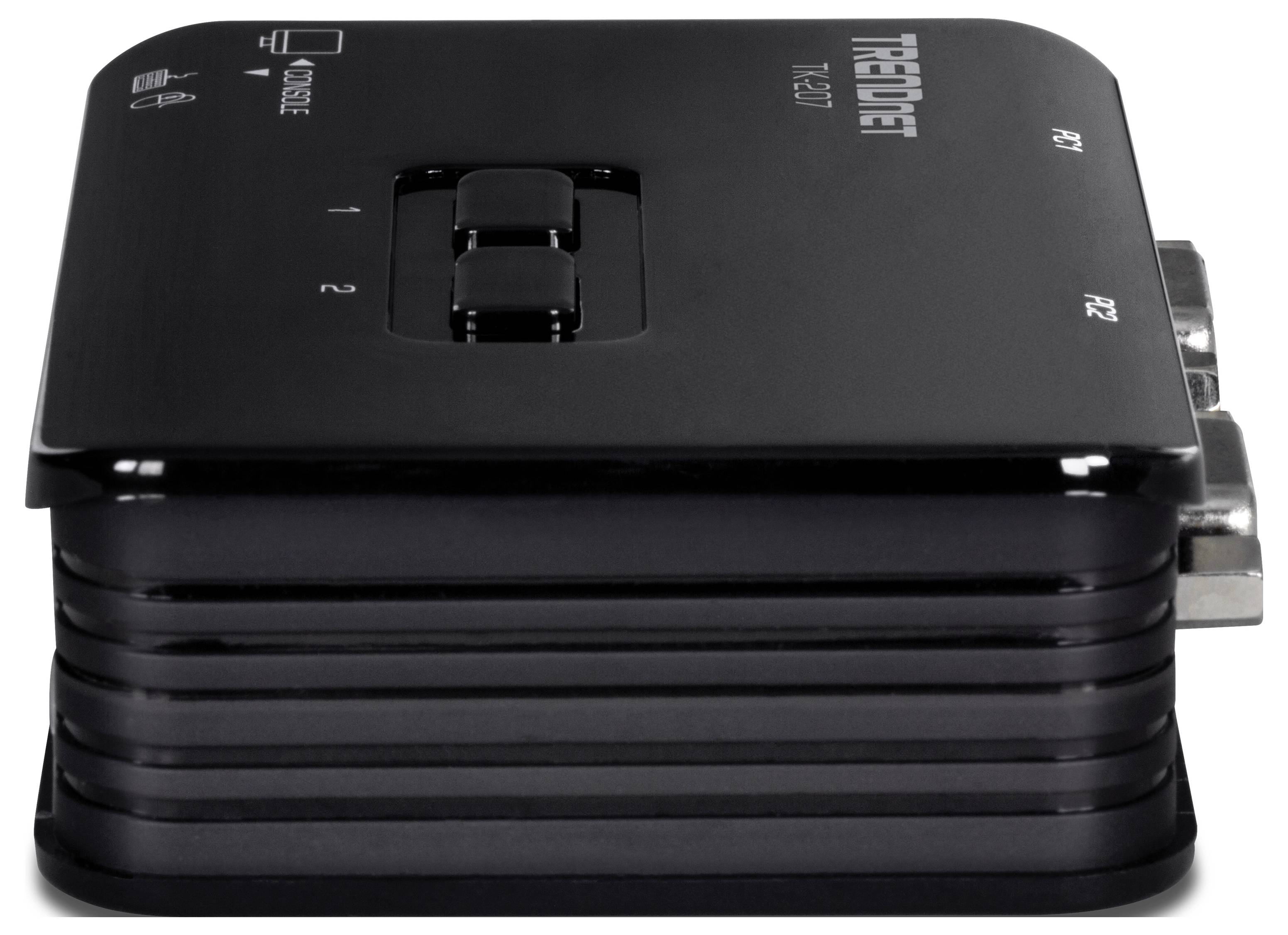 A black KVM switch with two buttons labeled '1' and '2' on its top surface, used for toggling control between two computers.