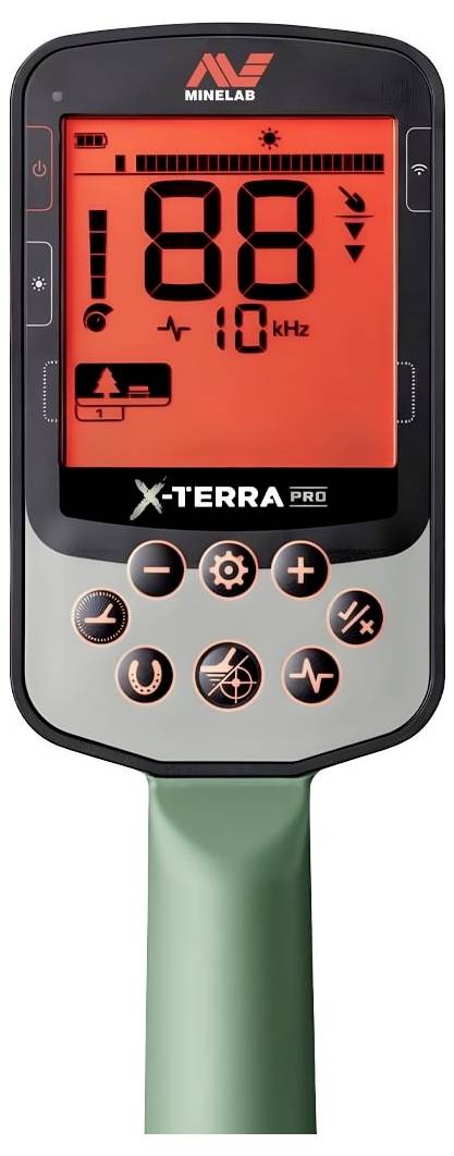 A metal detector control panel displays settings with a digital screen showing a frequency of '10 kHz' and various function buttons below.