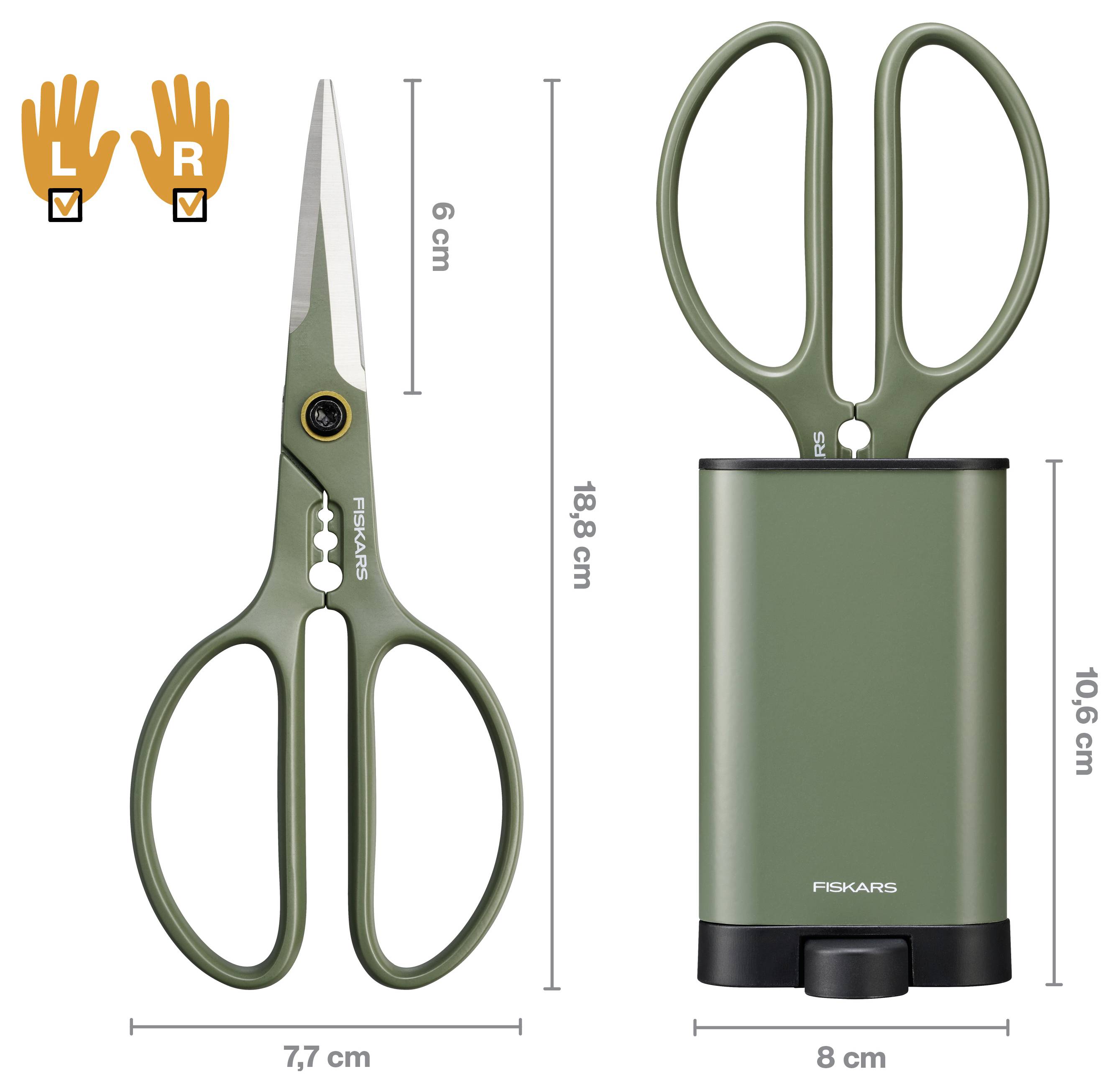 'Fiskars' multifunction scissors with 7.7 cm width, 6 cm blade length, shown with matching green storage case measuring 10.6 cm height.