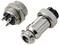 'Metal circular connectors with grooved edges and multiple pins, showing both male and female components for electronic connections.'
