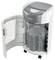 A white paper shredder with its door open, showing shredded paper inside. Buttons and a power light are visible on the top panel.