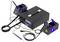 A soldering station setup includes a control unit with a digital display, two soldering irons, and stands, designed for electronics work.