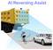 'AI Reversing Assist' illustration showing a truck with a camera and sensor detecting a cyclist and a car in its rear path.