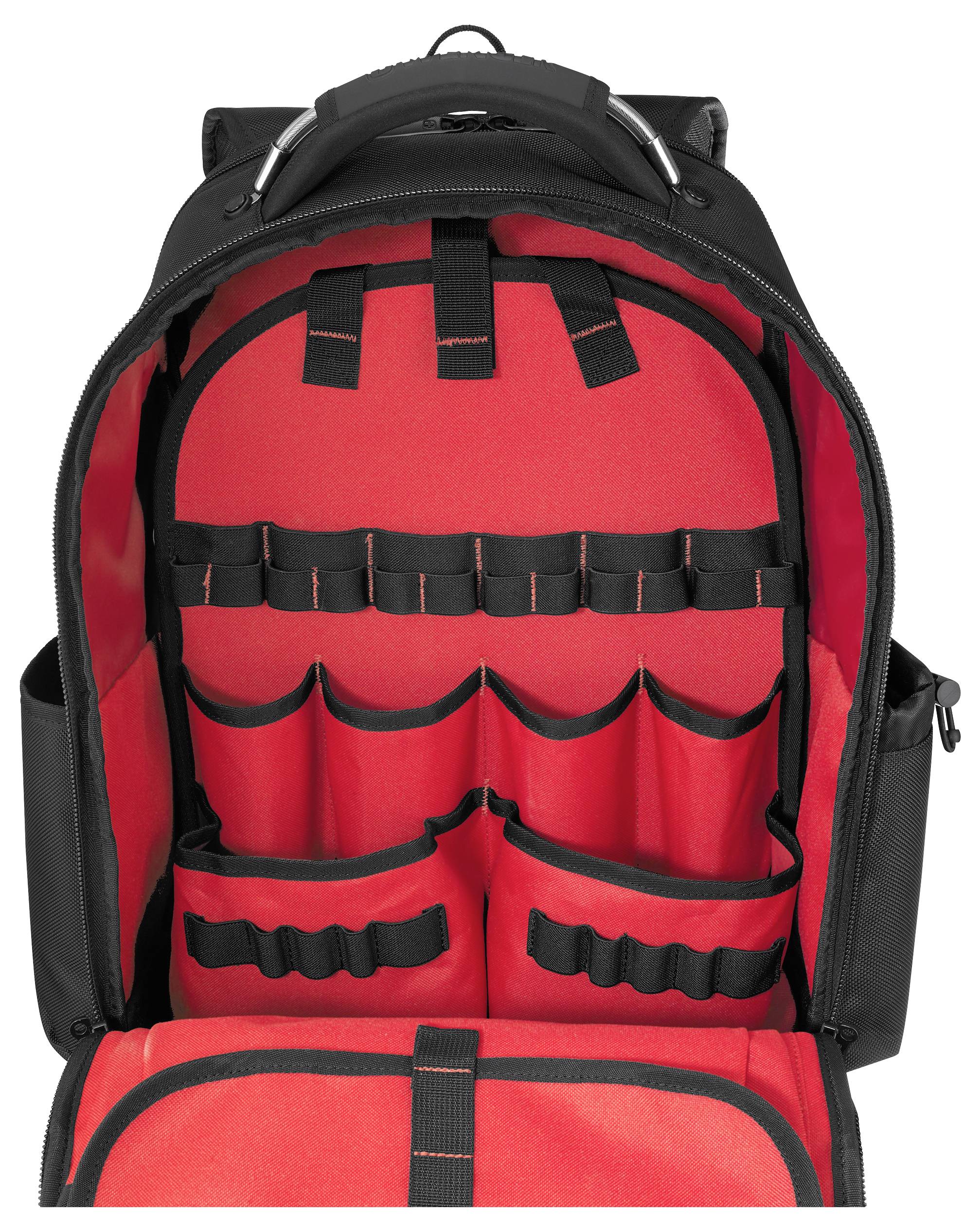 Open black backpack with red interior, showcasing multiple compartments and pockets for organizing tools or equipment.