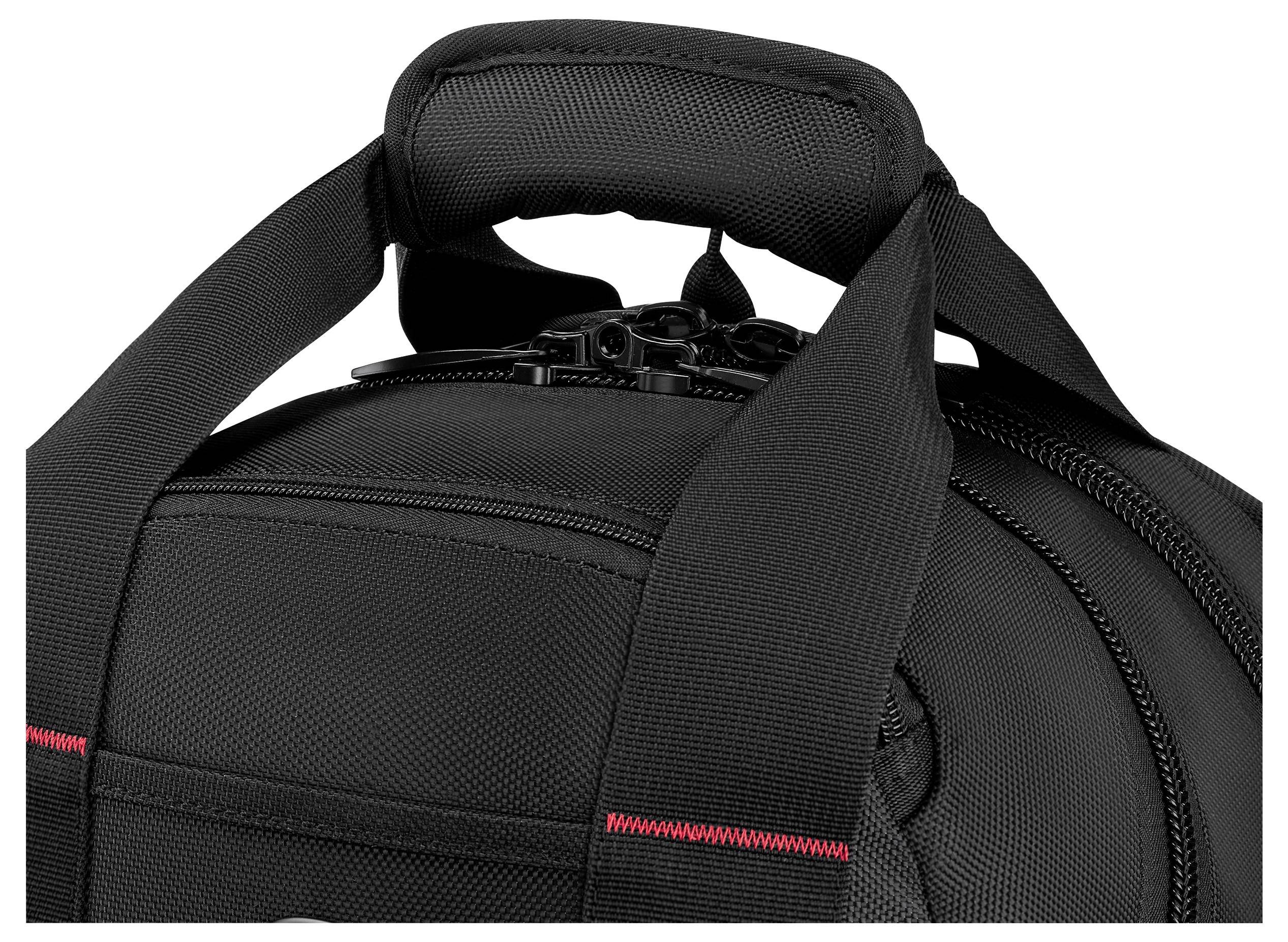 Close-up of a black sports bag showing the handle, zipper, and two straps with red stitching detail against a white background.