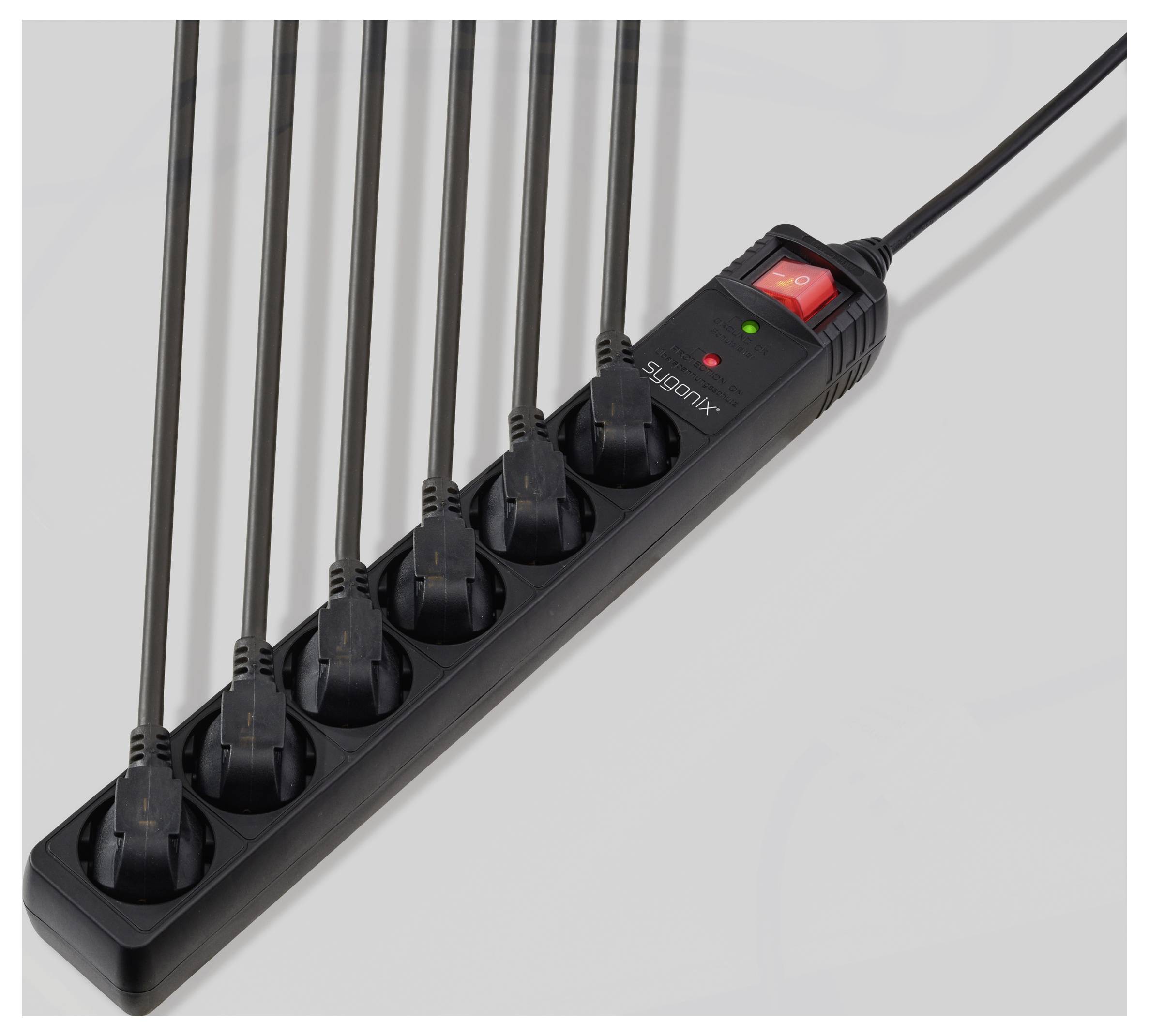 A black power strip with eight sockets, each occupied by a plug. An illuminated red switch indicates the strip is turned on.