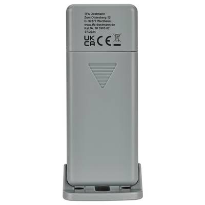 A gray rectangular electronic device with product information and symbols printed on it, including 'UKCA' and 'CE' certification marks.