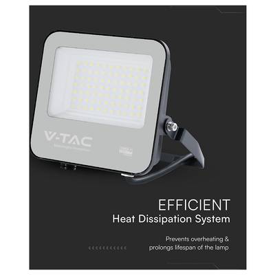 LED floodlight with 'V-TAC' branding, featuring a heat dissipation system. Text: 'Prevents overheating & prolongs lifespan of the lamp.'