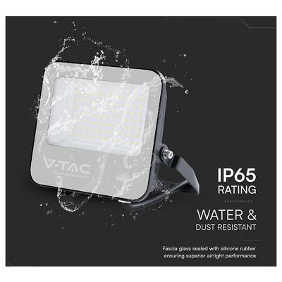 'V-TAC LED floodlight with IP65 rating, water splashes shown. Text reads: IP65 Rating, Water & Dust Resistant, airtight performance.'