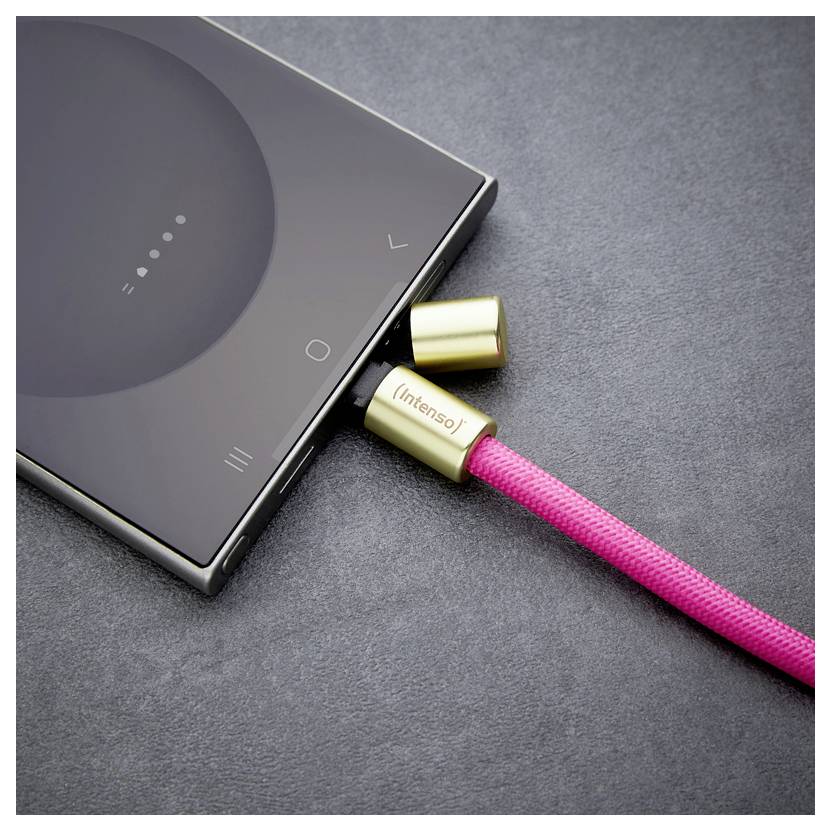 A smartphone connected to a pink braided charging cable with gold connectors labeled 'Intenso' on a gray surface.
