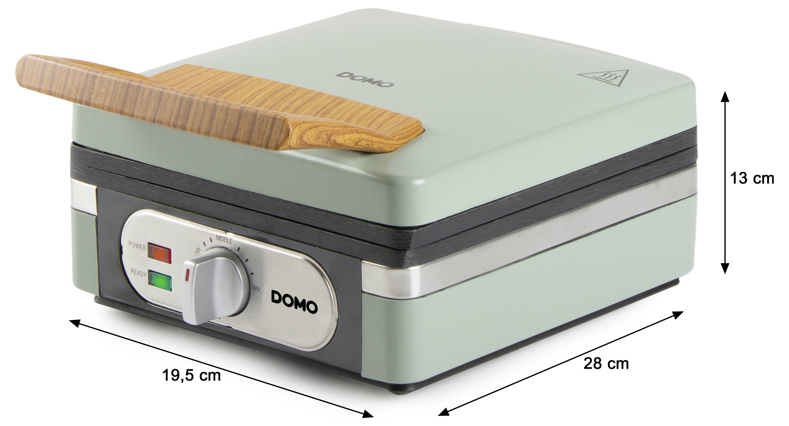 'A green waffle maker with a wooden handle, dimensions labeled: 19.5 cm wide, 28 cm long, and 13 cm high, brand name DOMO.'